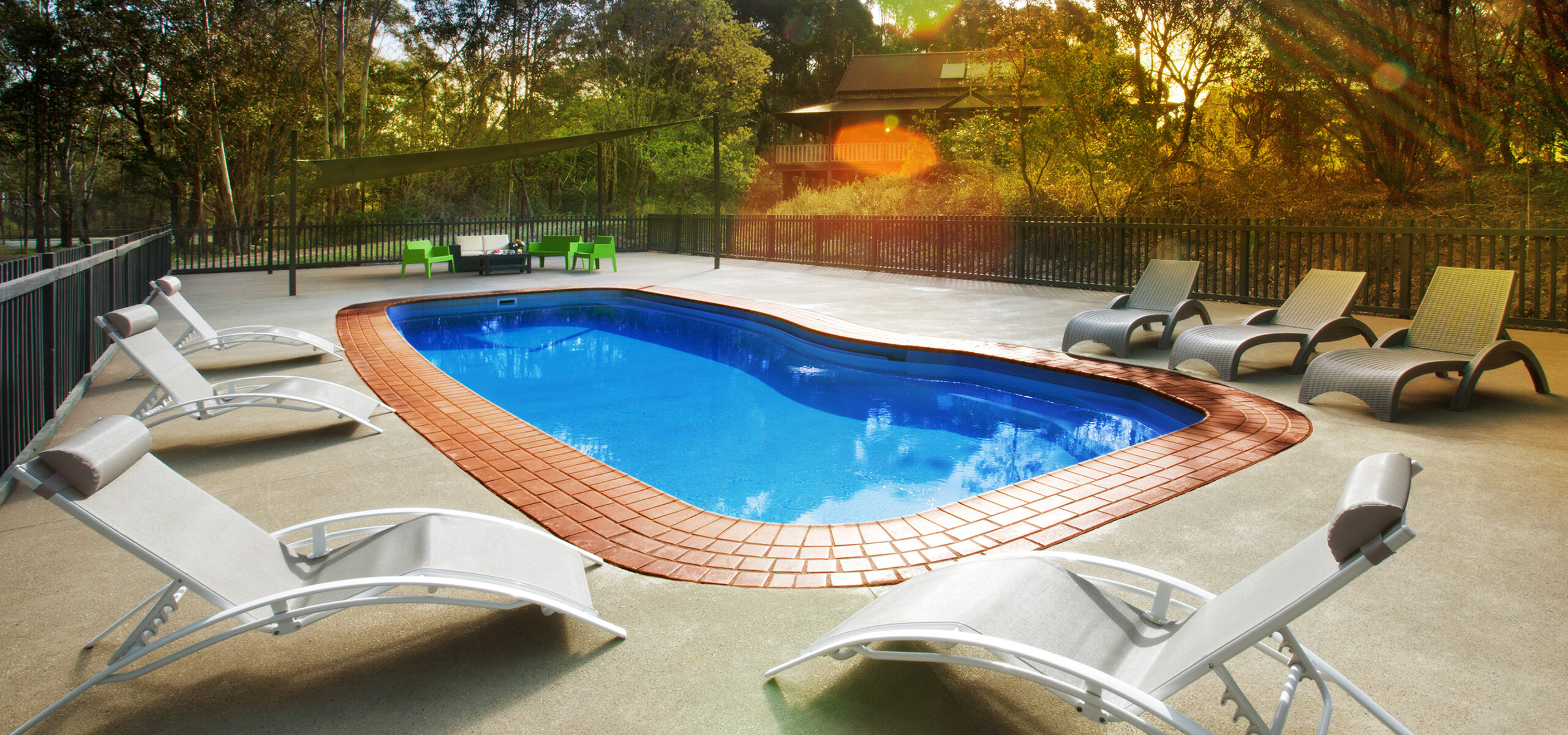 Melaleuca Seaside Retreat - Sun Lounges to Swimming Pool View